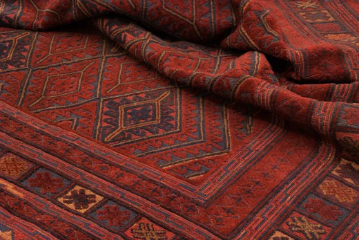 Differentiating Between an Afghan Rug that needs Cleaning or Replacing